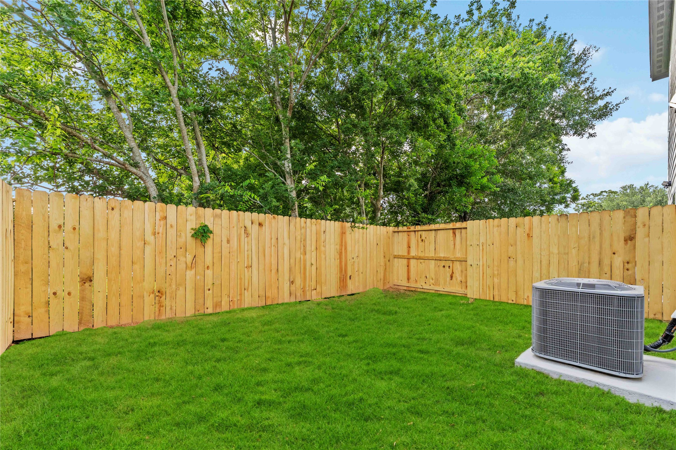 4201 Mallow Street Houston, TX 77051 - Photo 23 of 23 a view of a backyard with wooden fence