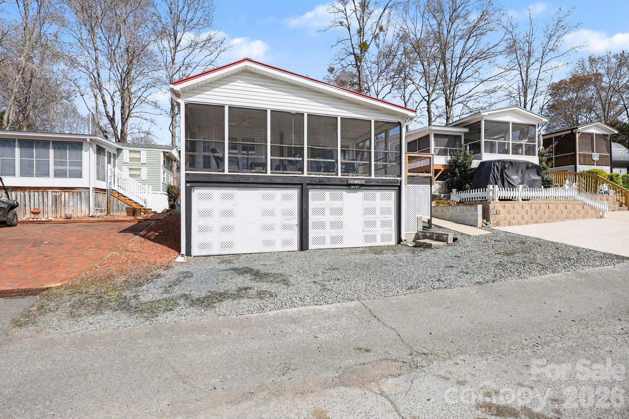 122 Maple Street New London, NC 28127 - Photo 16 of 29 a view of a house with a outdoor space
