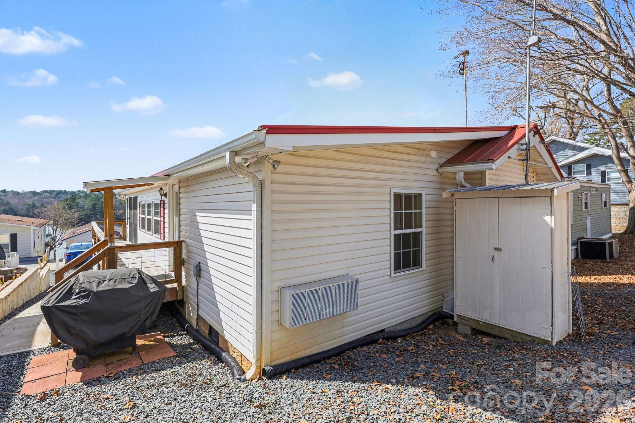 122 Maple Street New London, NC 28127 - Photo 17 of 29 a view of a small house