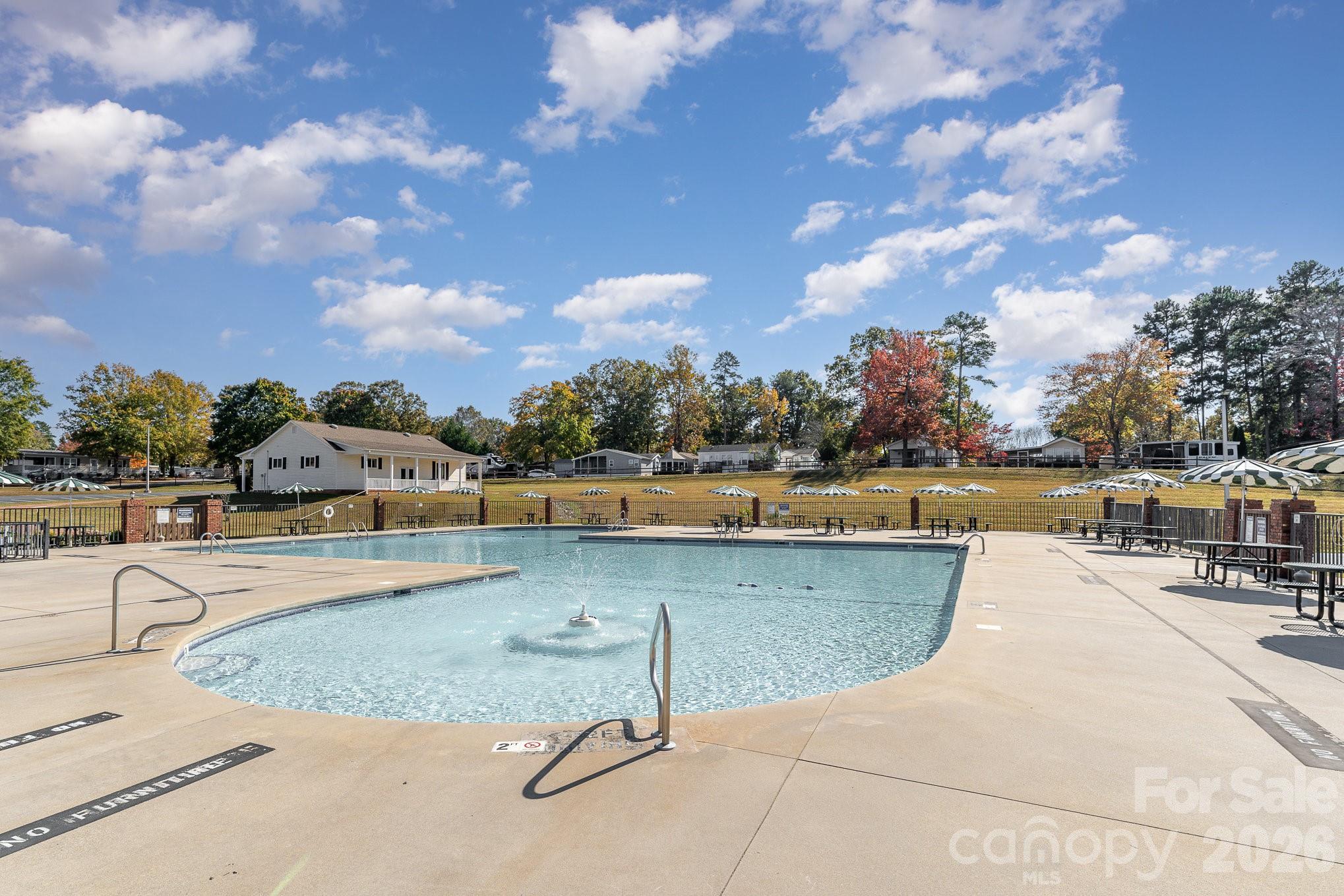 122 Maple Street New London, NC 28127 - Photo 24 of 29 a view of a swimming pool and outdoor space