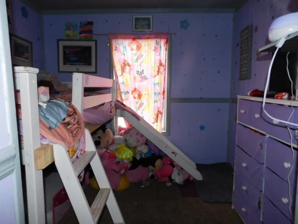 a room with toys and flat screen tv