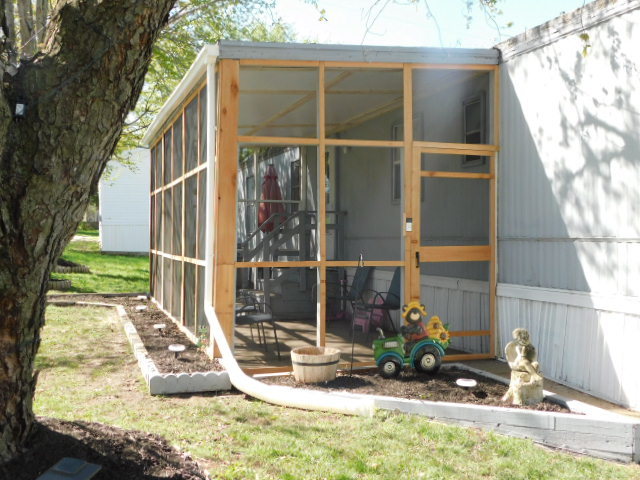 5101 Pebble Lane Loves Park, IL 61111 - Photo 2 of 17 a view of a house with a yard