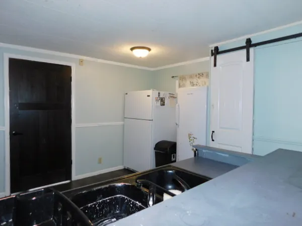 a room with black and white door