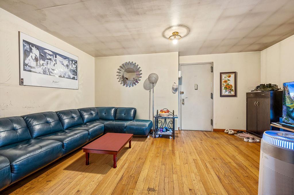 43-07 162nd Street Queens, NY 11358 - Photo 13 of 18 Living area featuring light wood-type flooring