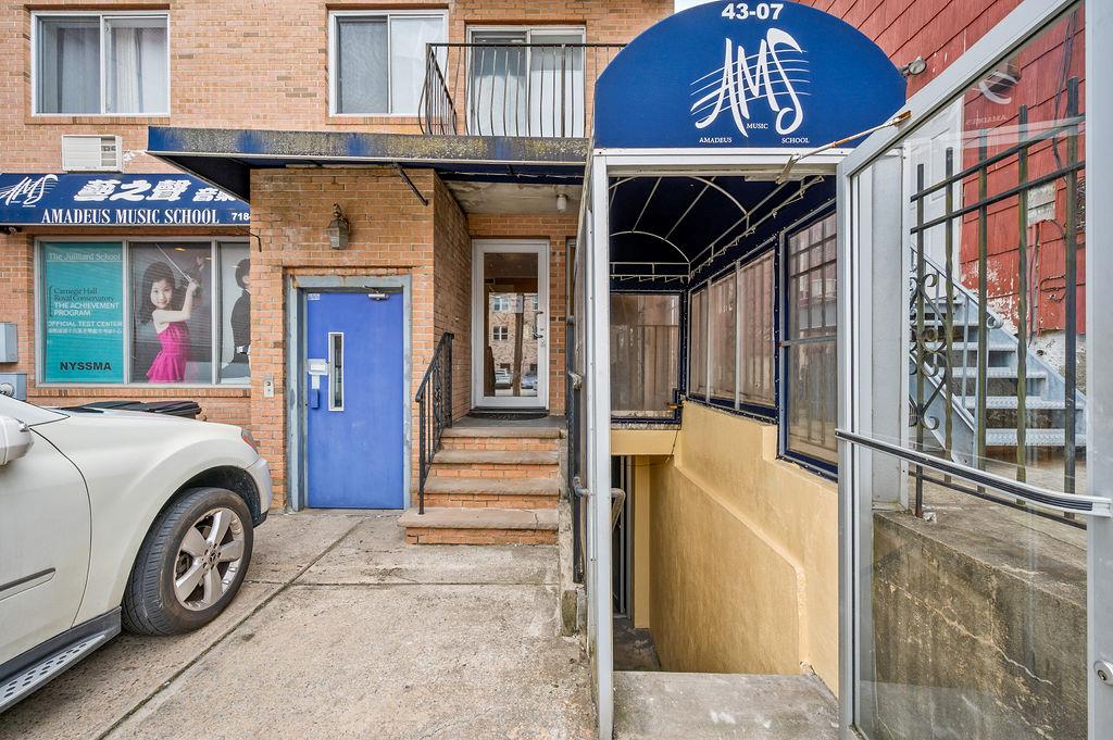 43-07 162nd Street Queens, NY 11358 - Photo 17 of 18 View of exterior entry featuring brick siding