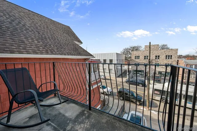 a view of a balcony with an outdoor space
