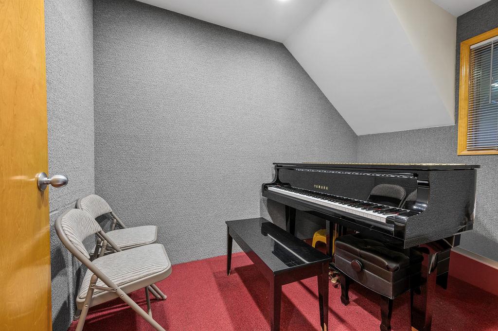 43-07 162nd Street Queens, NY 11358 - Photo 6 of 18 Living area featuring lofted ceiling and carpet flooring