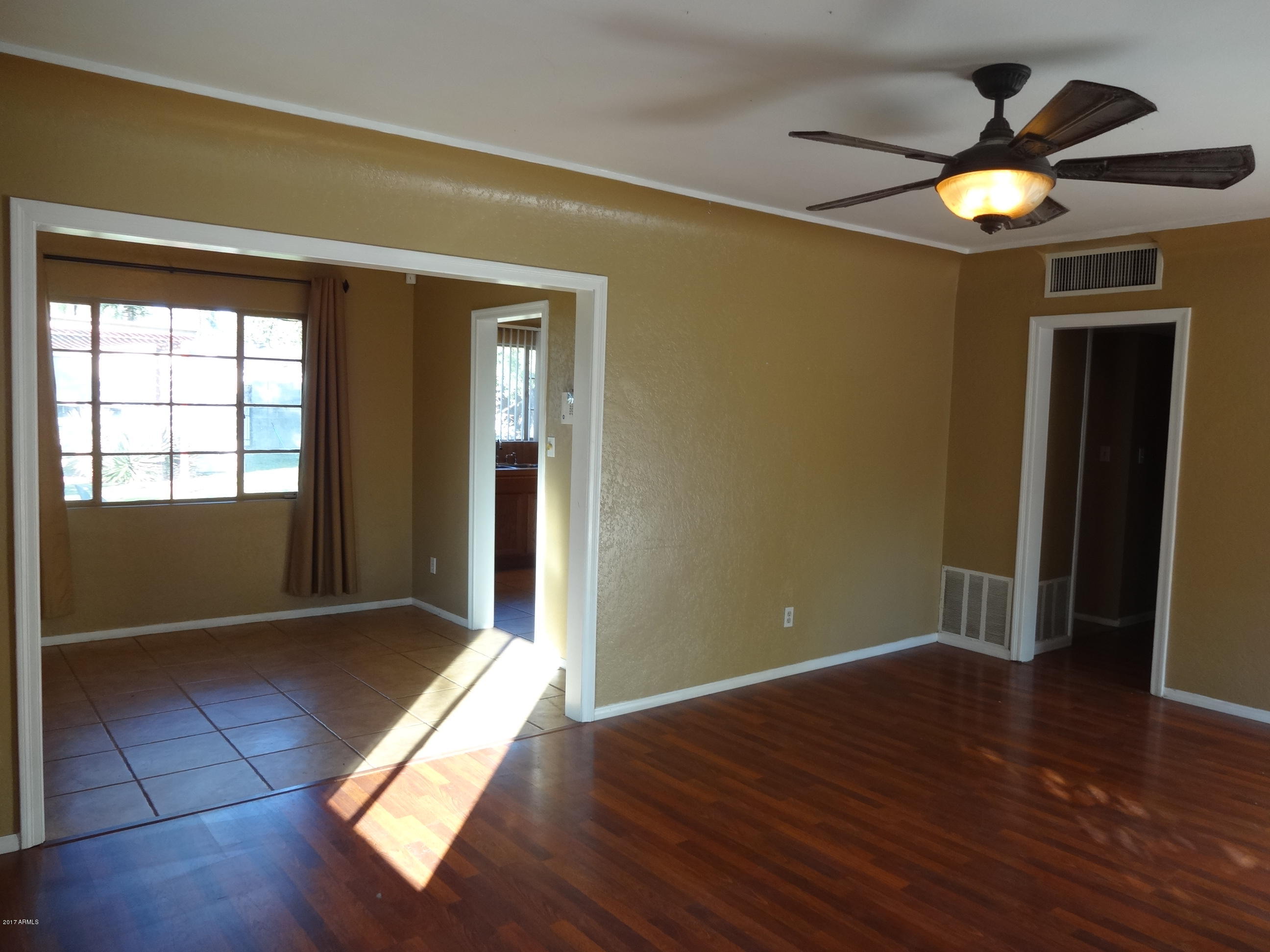 1906 East Roma Avenue Phoenix, AZ 85016 - Photo 6 of 21 Main House Living into Dining Room