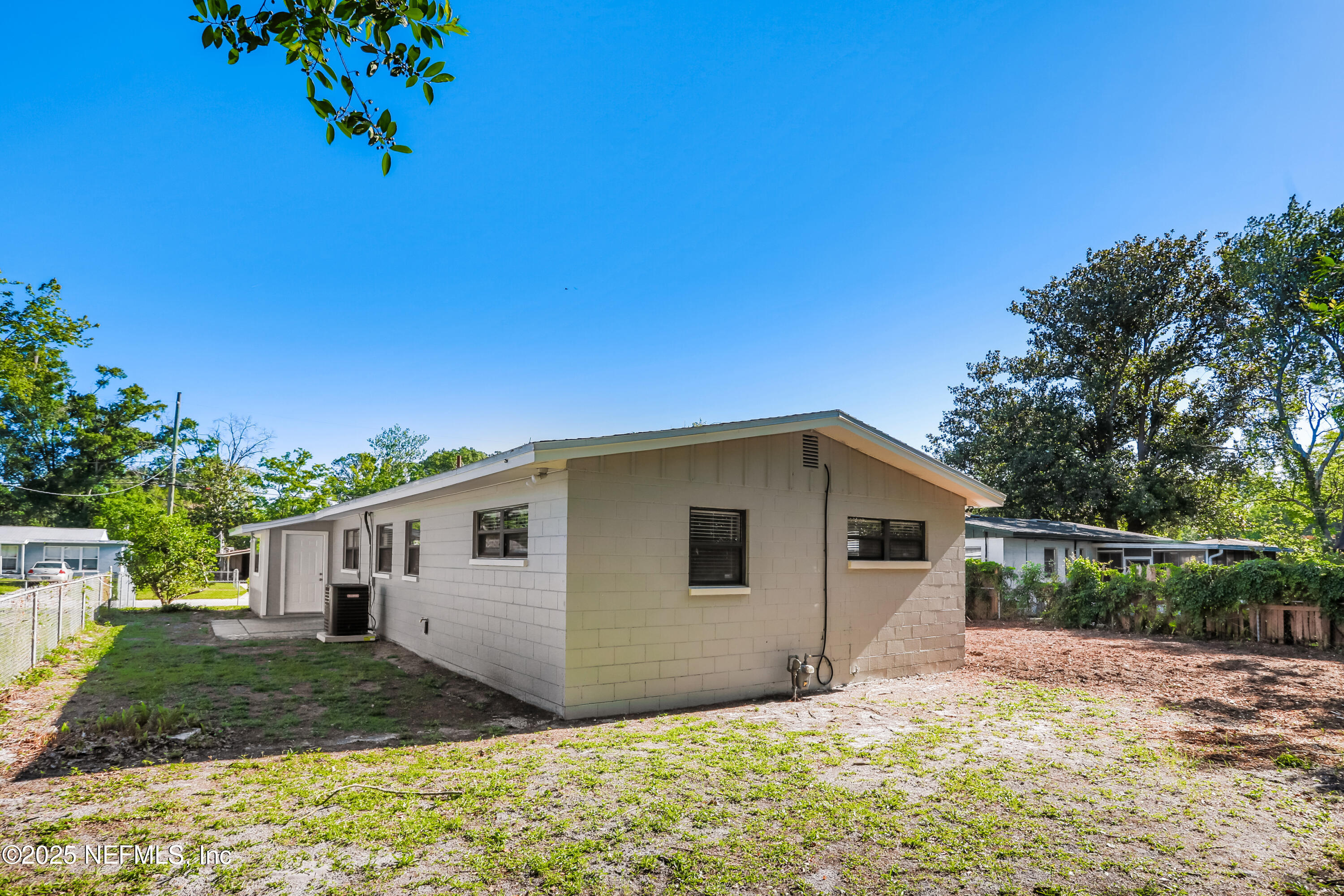 7428 Centauri Road Jacksonville, FL 32210 - Photo 15 of 15 a view of a house with a yard