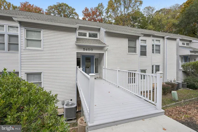 a view of a house with a white door