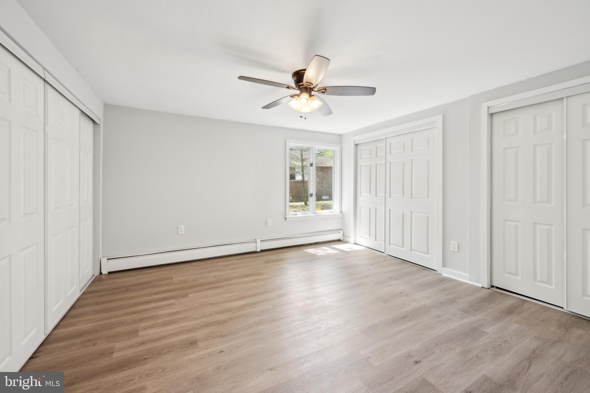 47 Lakeview Drive Tabernacle, NJ 08088 - Photo 12 of 25 wooden floor in an empty room with a window