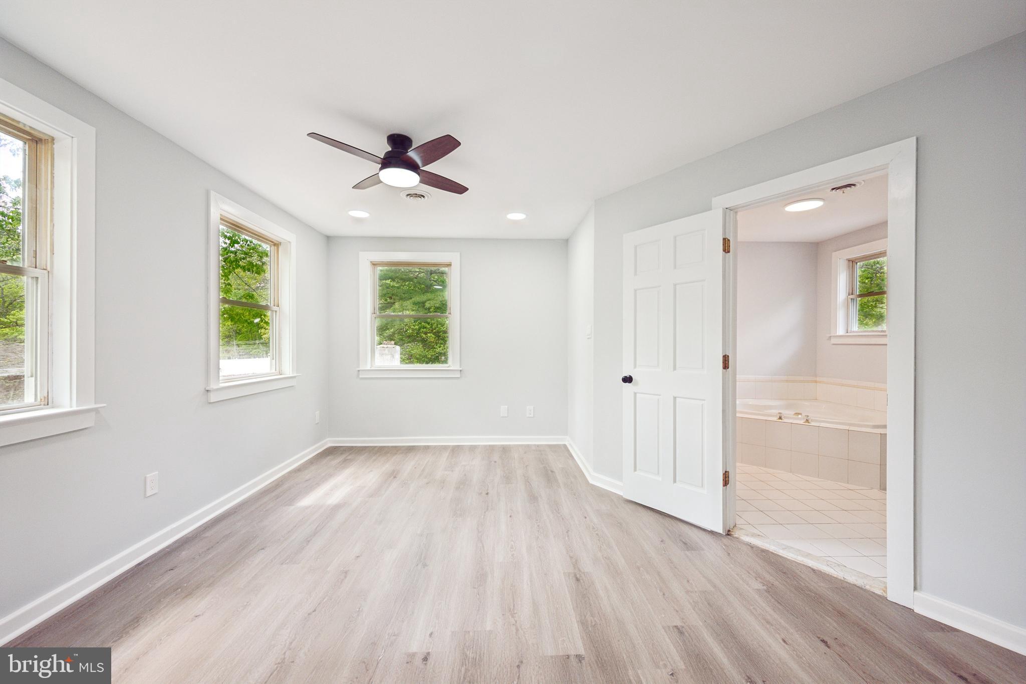 47 Lakeview Drive Tabernacle, NJ 08088 - Photo 17 of 25 wooden floor in an empty room with a window