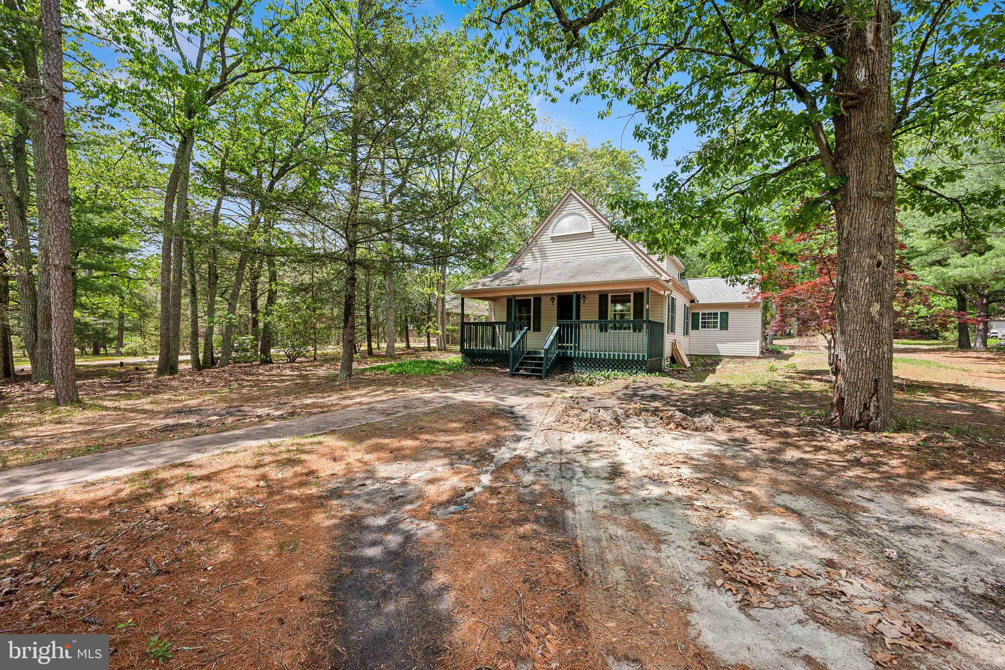 47 Lakeview Drive Tabernacle, NJ 08088 - Photo 2 of 25 a front view of a house with a yard