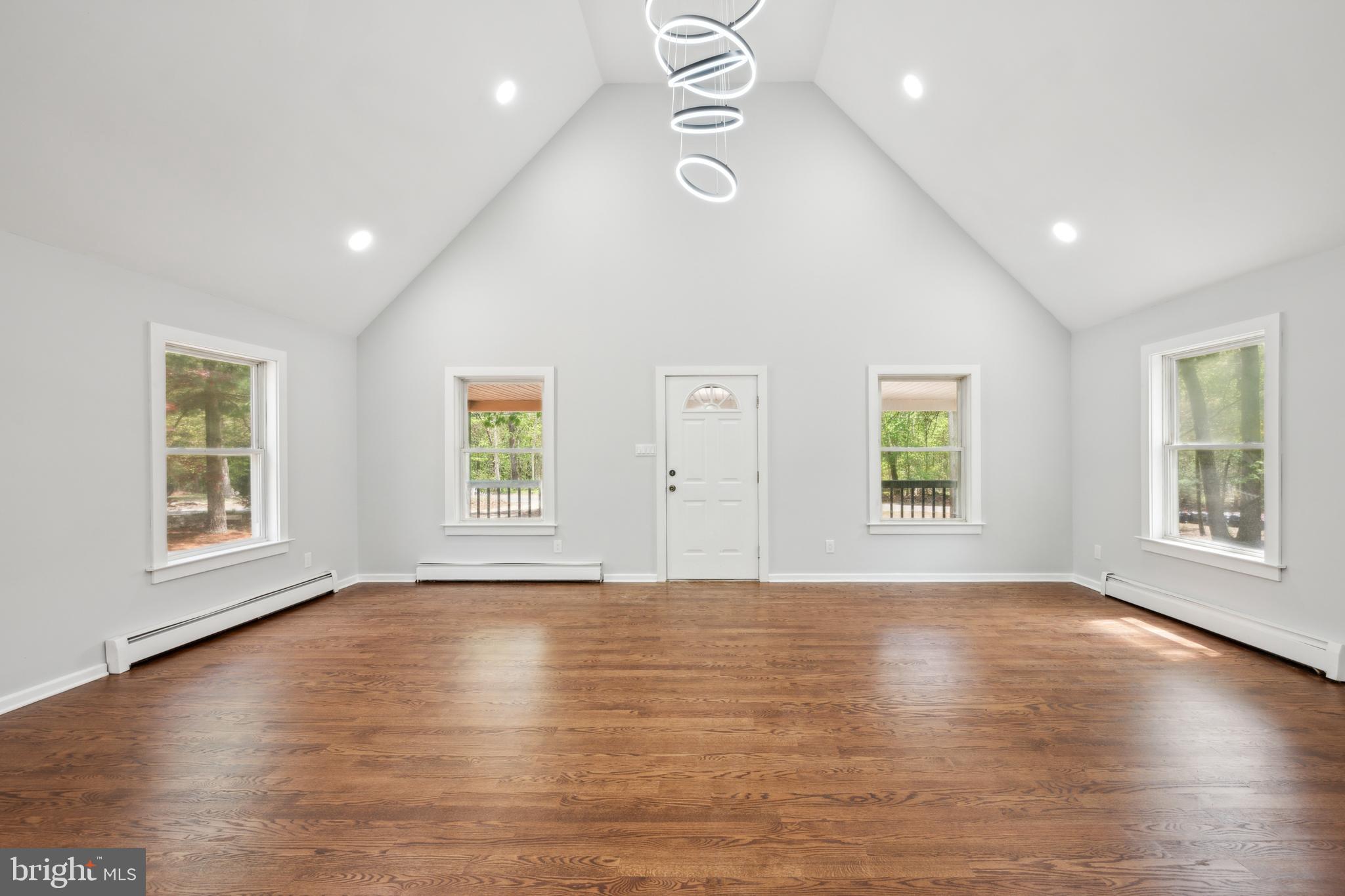 47 Lakeview Drive Tabernacle, NJ 08088 - Photo 10 of 25 a view of an empty room with wooden floor and a window