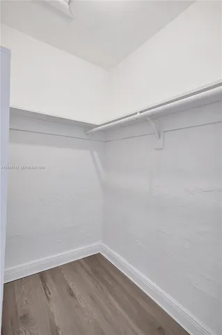 a view of an empty walk in closet