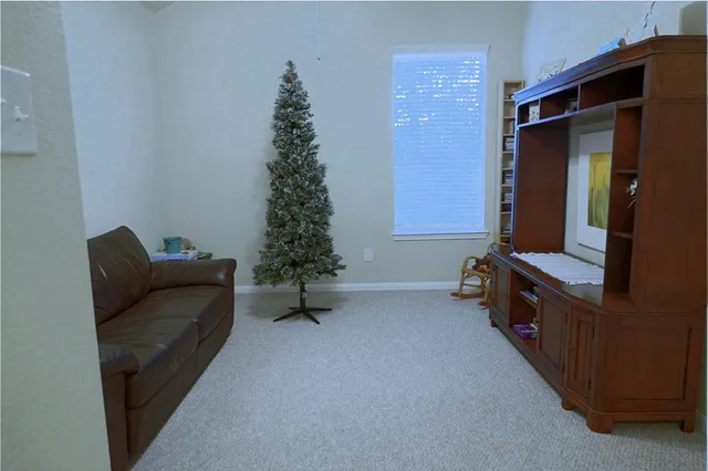 a view of an entryway with front door