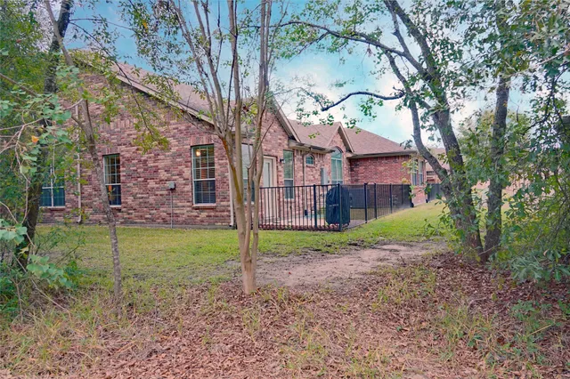 a view of a backyard with a garden