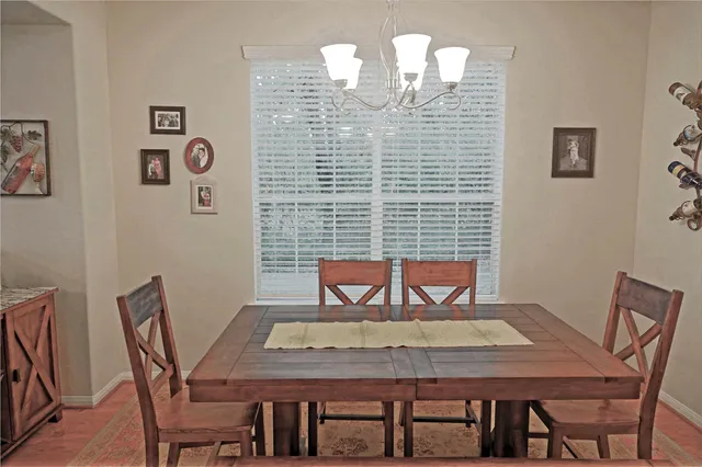 a view of a dining room with furniture
