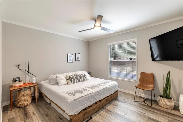 a bathroom with a sink toilet and mirror