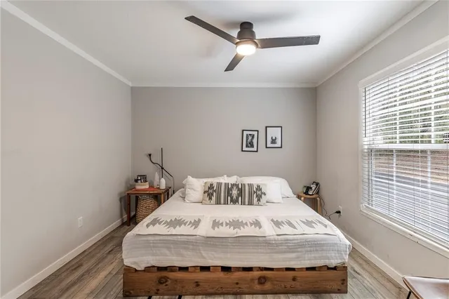a bathroom with a sink toilet and mirror