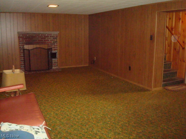 6608 Jefferson Road Ashtabula, OH 44004 - Photo 19 of 25 Rec room with wood burning fireplace