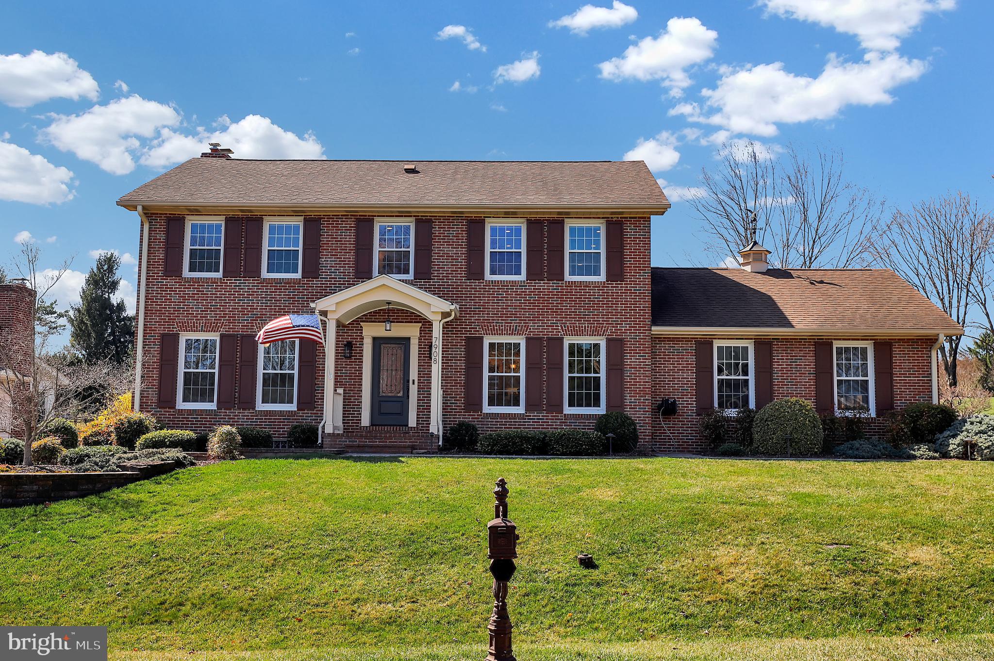 7908 River Run Court Frederick, MD 21701 - Photo 1 of 59 a front view of a house with garden