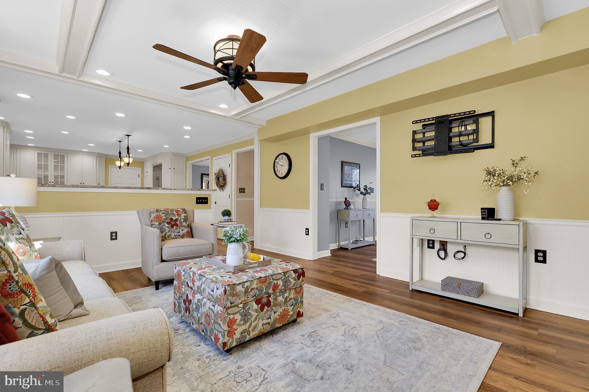 7908 River Run Court Frederick, MD 21701 - Photo 19 of 59 a living room with furniture and kitchen view