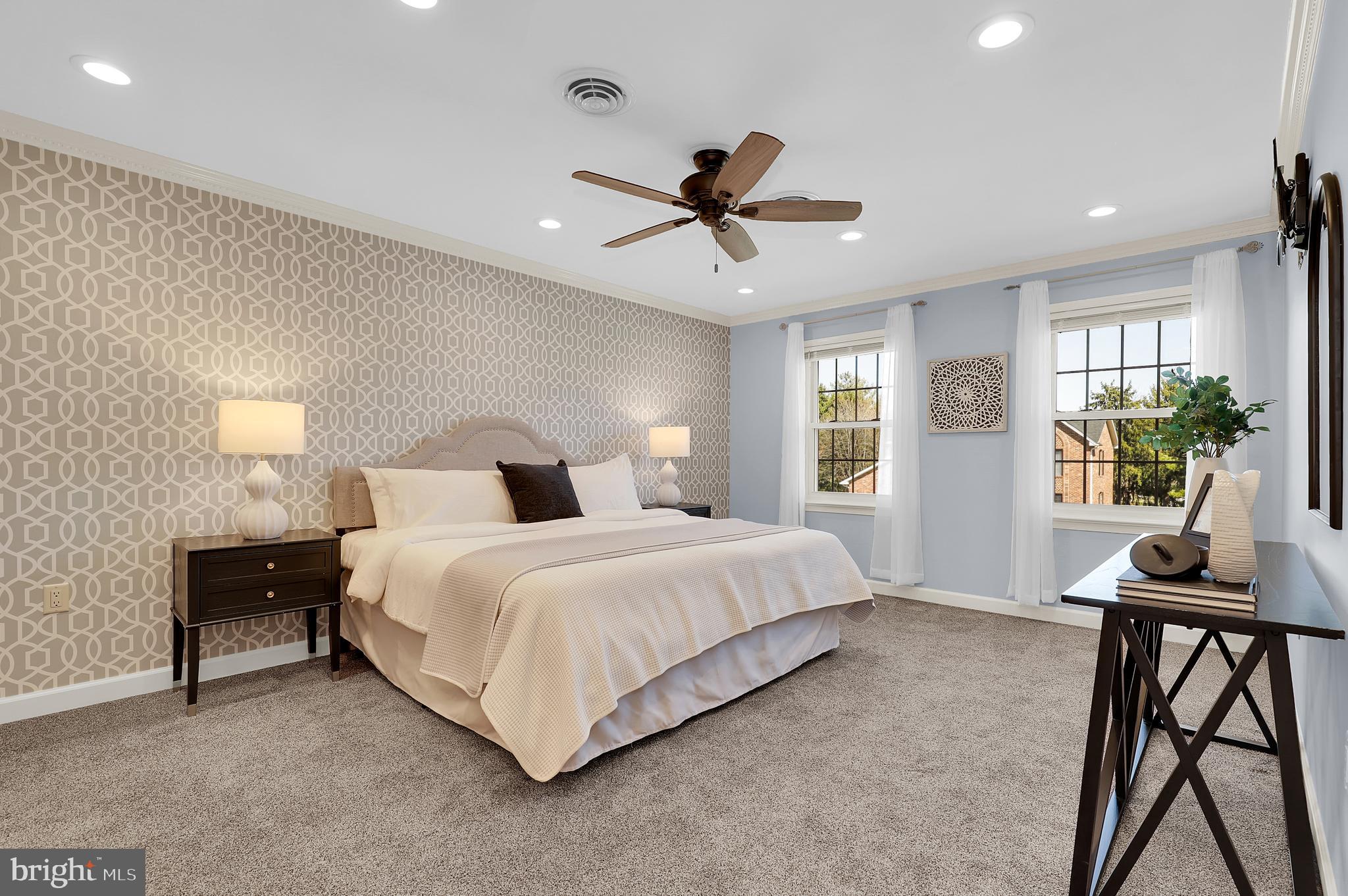 7908 River Run Court Frederick, MD 21701 - Photo 20 of 59 a bedroom with a bed and a desk