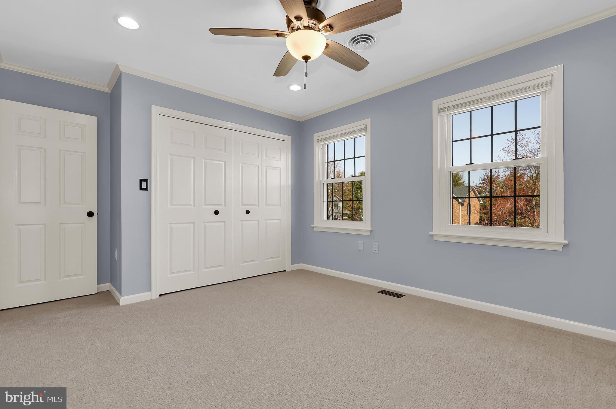 7908 River Run Court Frederick, MD 21701 - Photo 26 of 59 a view of an empty room with a window