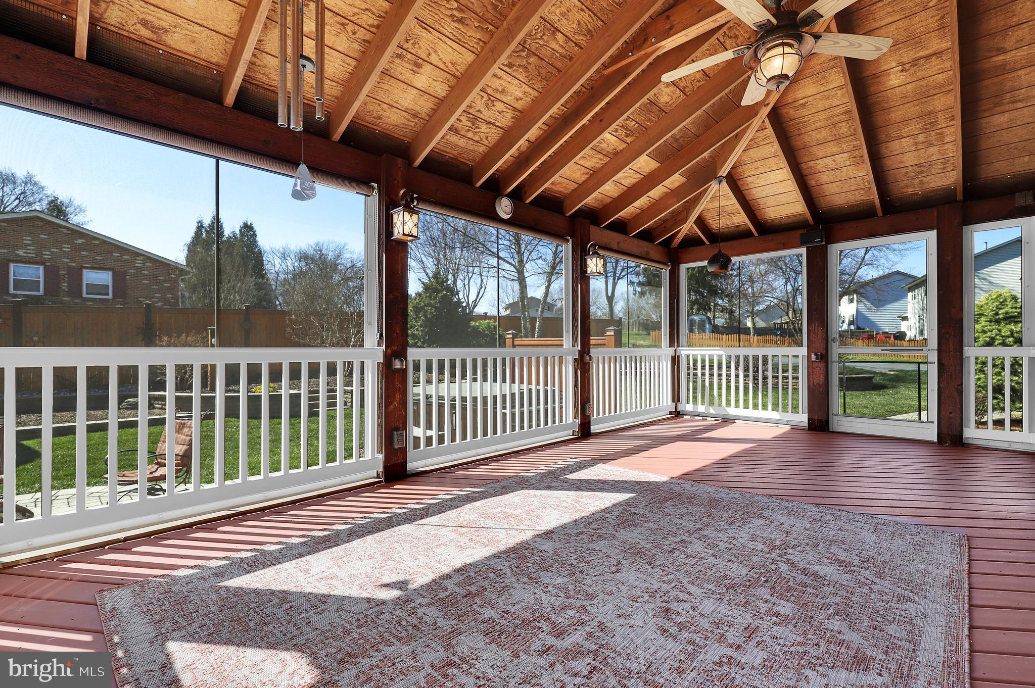 7908 River Run Court Frederick, MD 21701 - Photo 40 of 59 a view of porch with a ceiling fan and outdoor space