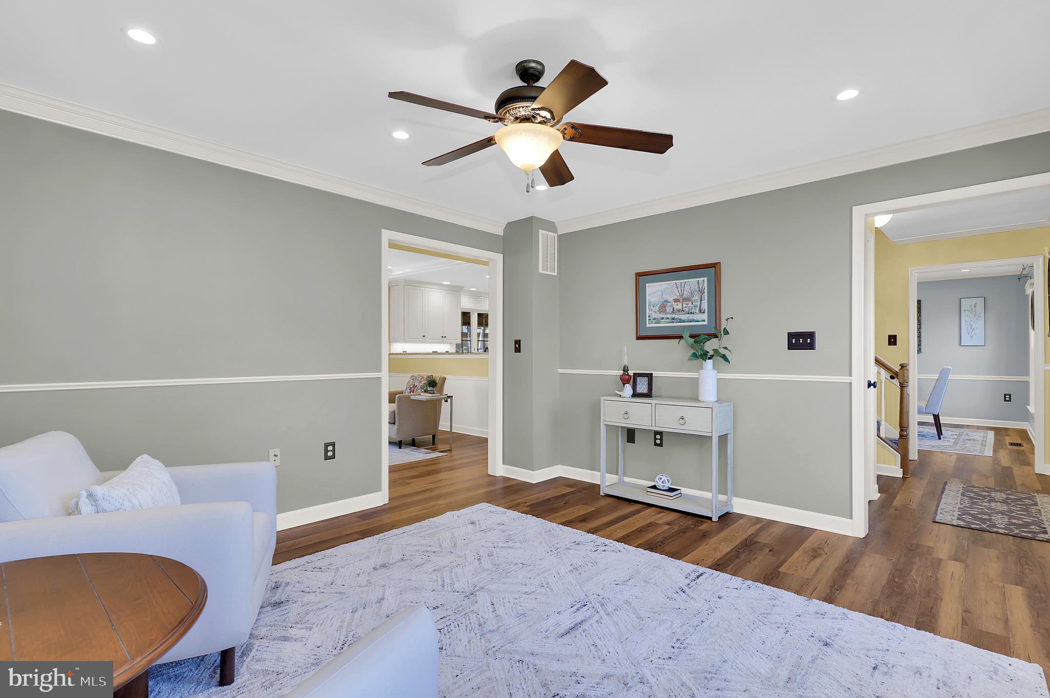7908 River Run Court Frederick, MD 21701 - Photo 4 of 59 a living room with furniture and a wooden floor