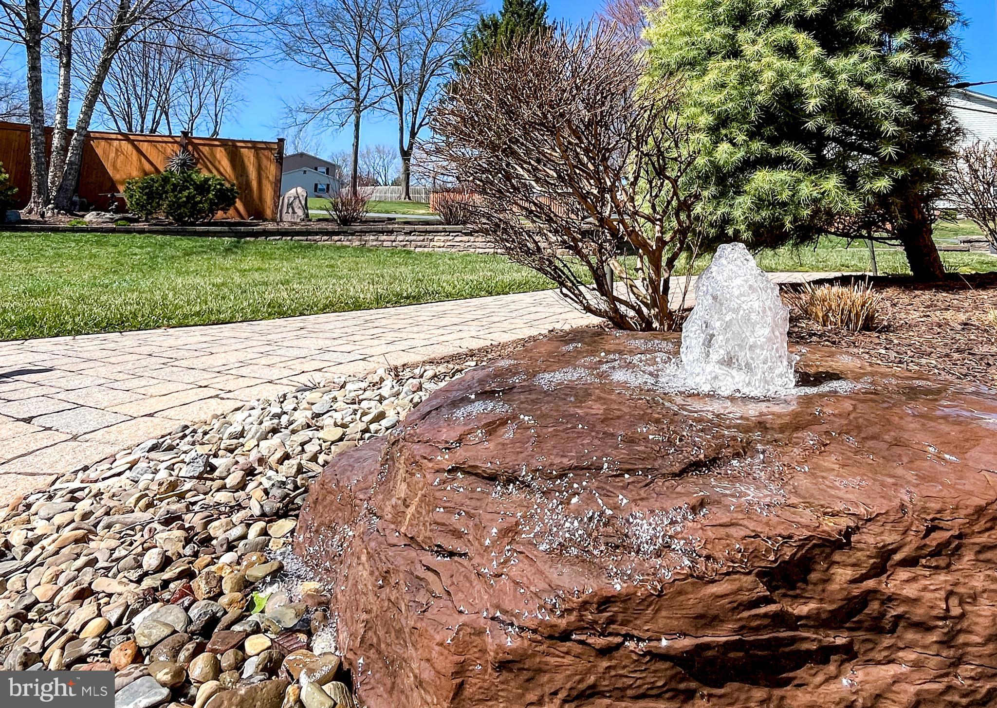 7908 River Run Court Frederick, MD 21701 - Photo 41 of 59 a view of a backyard with large trees