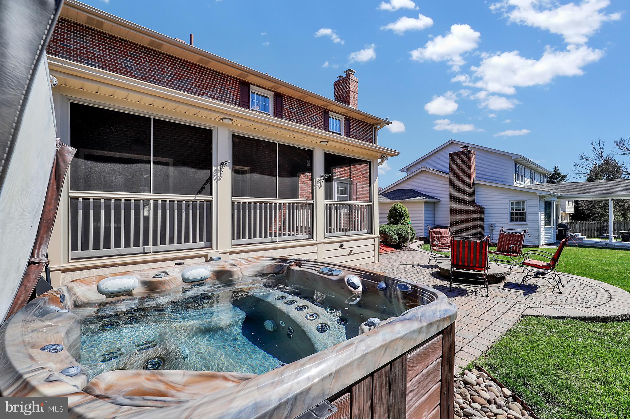 7908 River Run Court Frederick, MD 21701 - Photo 43 of 59 a view of a house with backyard porch and sitting area