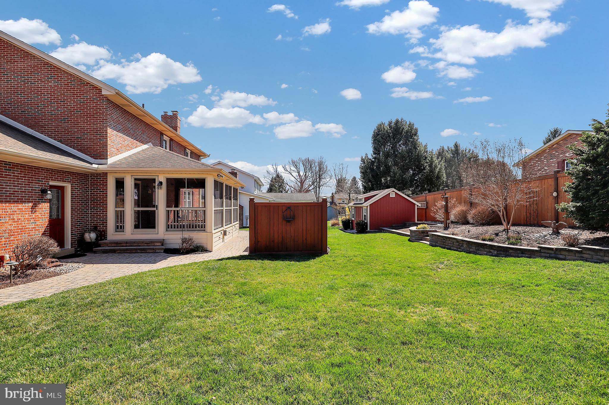 7908 River Run Court Frederick, MD 21701 - Photo 45 of 59 a backyard of a house with table and chairs