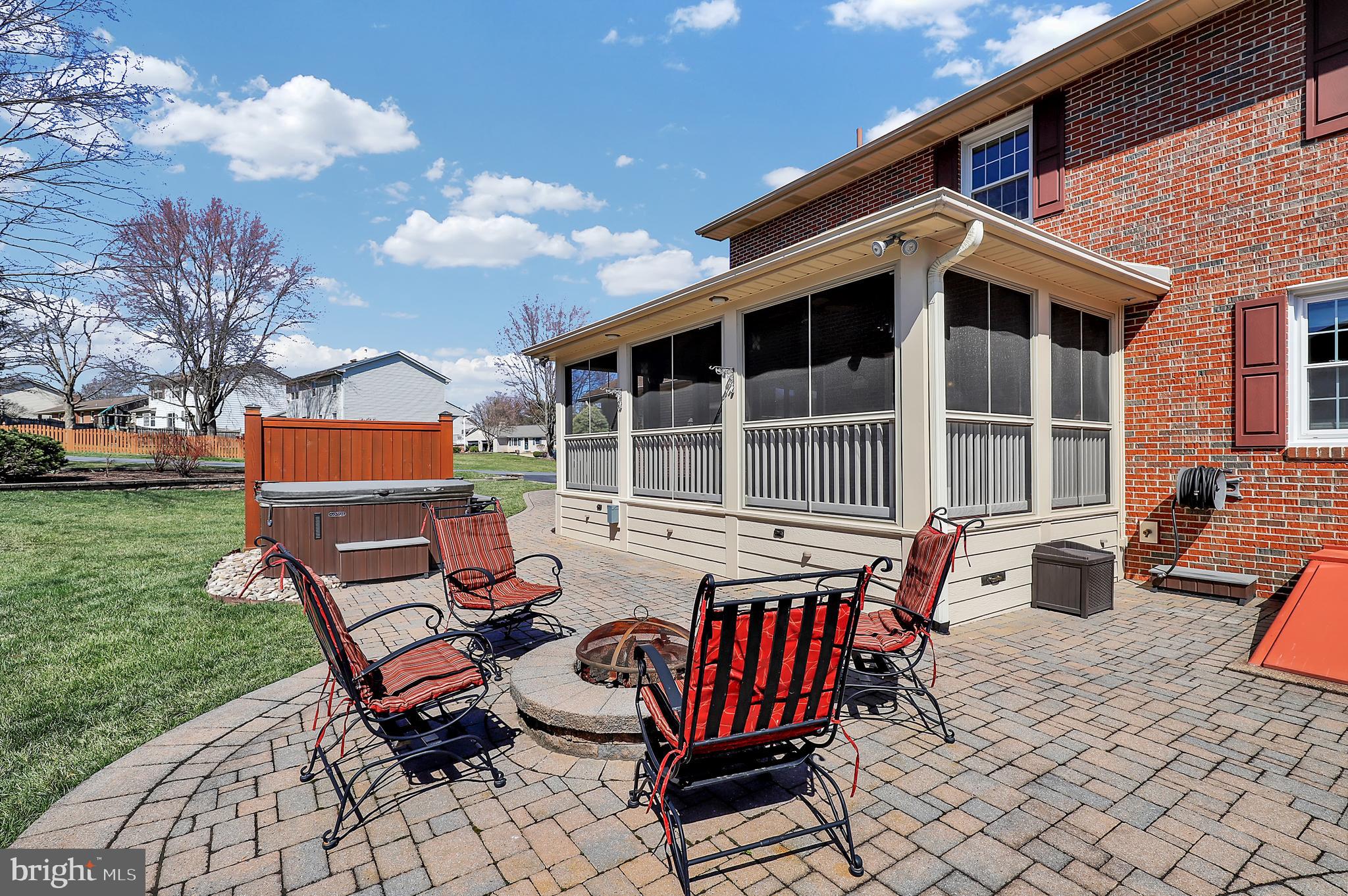 7908 River Run Court Frederick, MD 21701 - Photo 48 of 59 a view of a house with backyard sitting area and garden