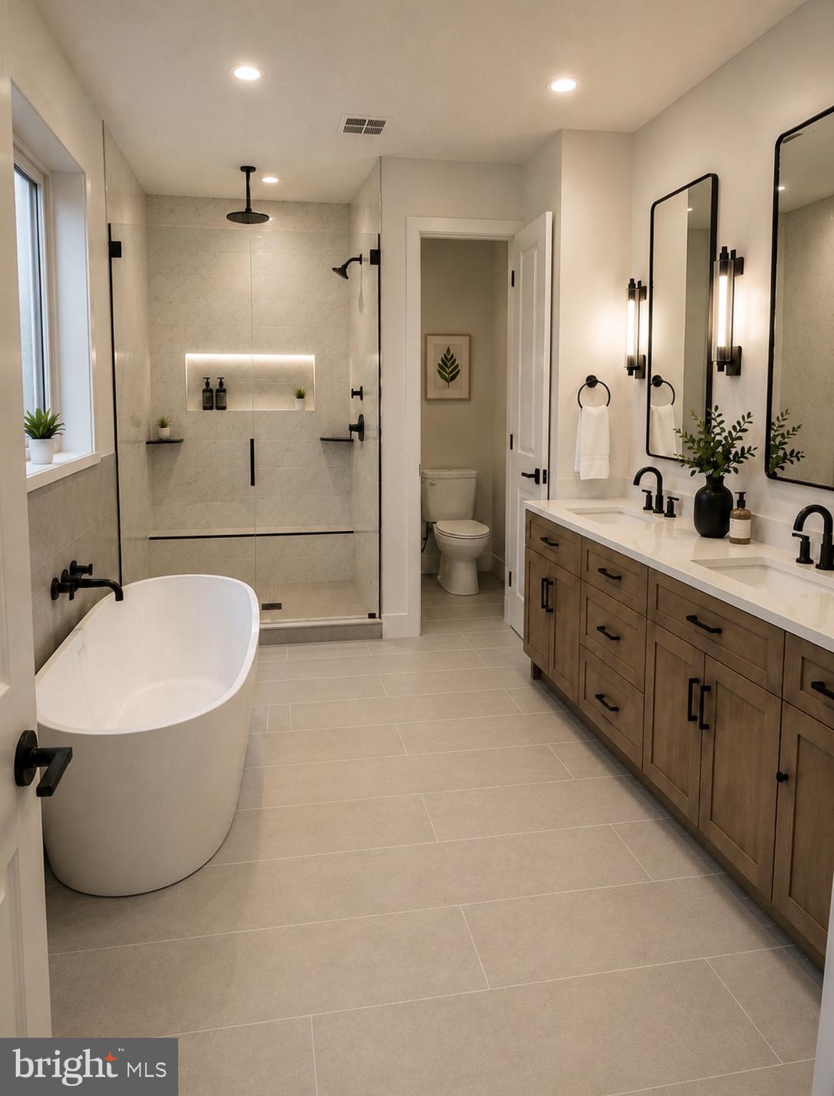 5612 Allender Road White Marsh, MD 21162 - Photo 5 of 9 a bathroom with a double vanity sink mirror and bathtub