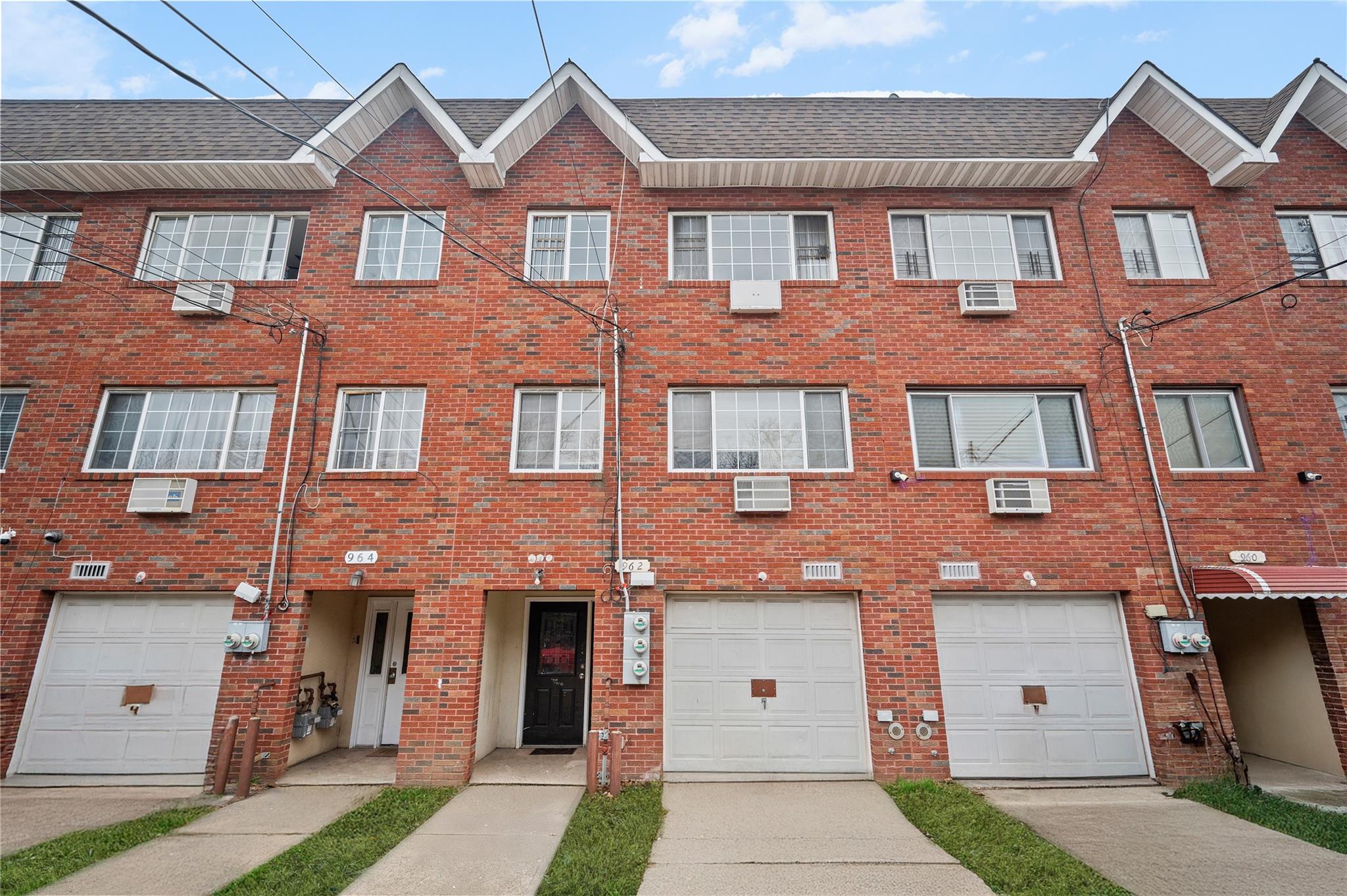 962 Hemlock Street Brooklyn, NY 11208 - Photo 1 of 1 a front view of a house