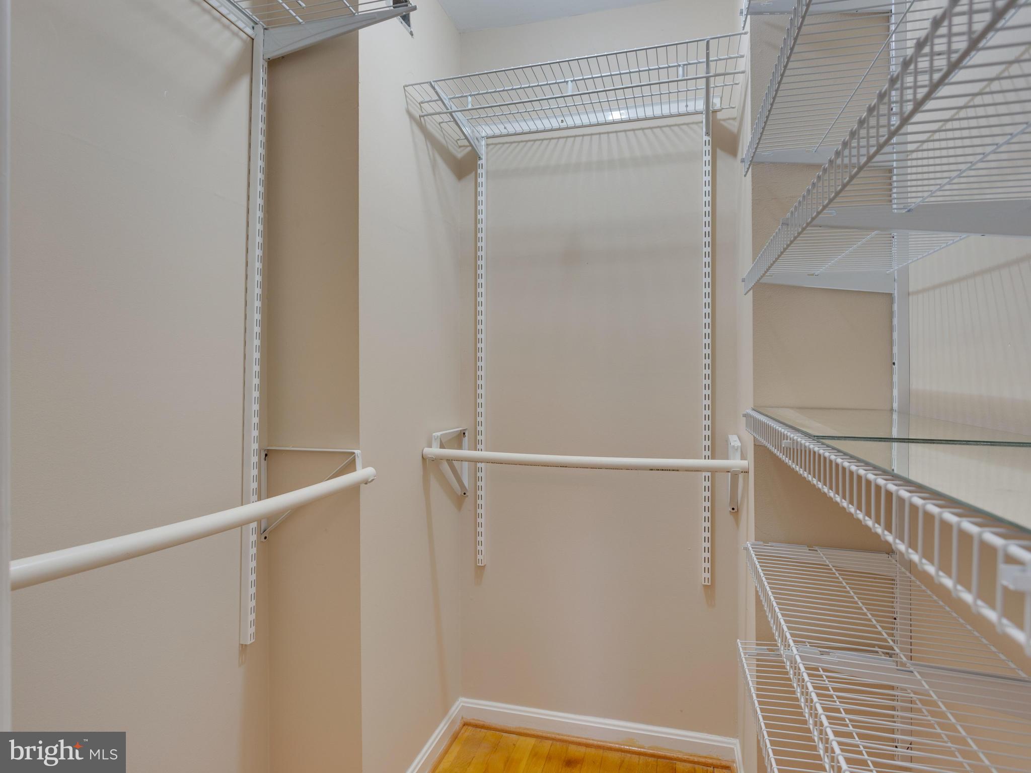 8702 Victoria Road Springfield, VA 22151 - Photo 12 of 27 a view of an empty walk in closet