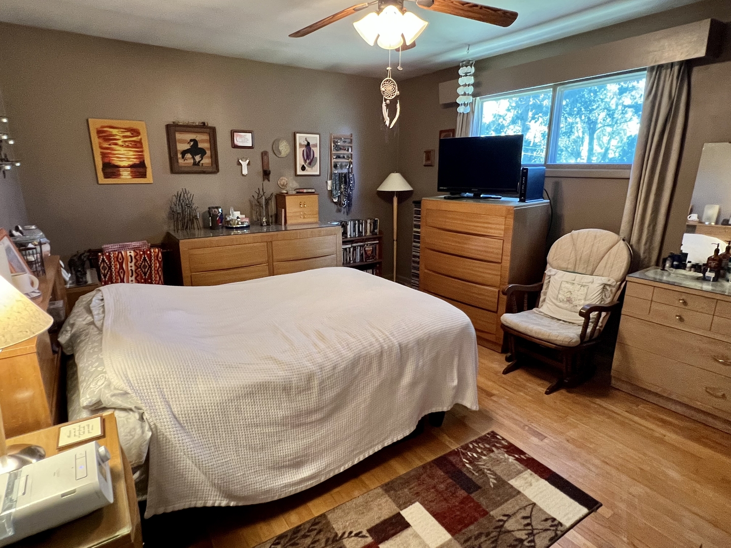 3819 Rugen Road Glenview, IL 60025 - Photo 11 of 24 a bedroom with a bed and furniture