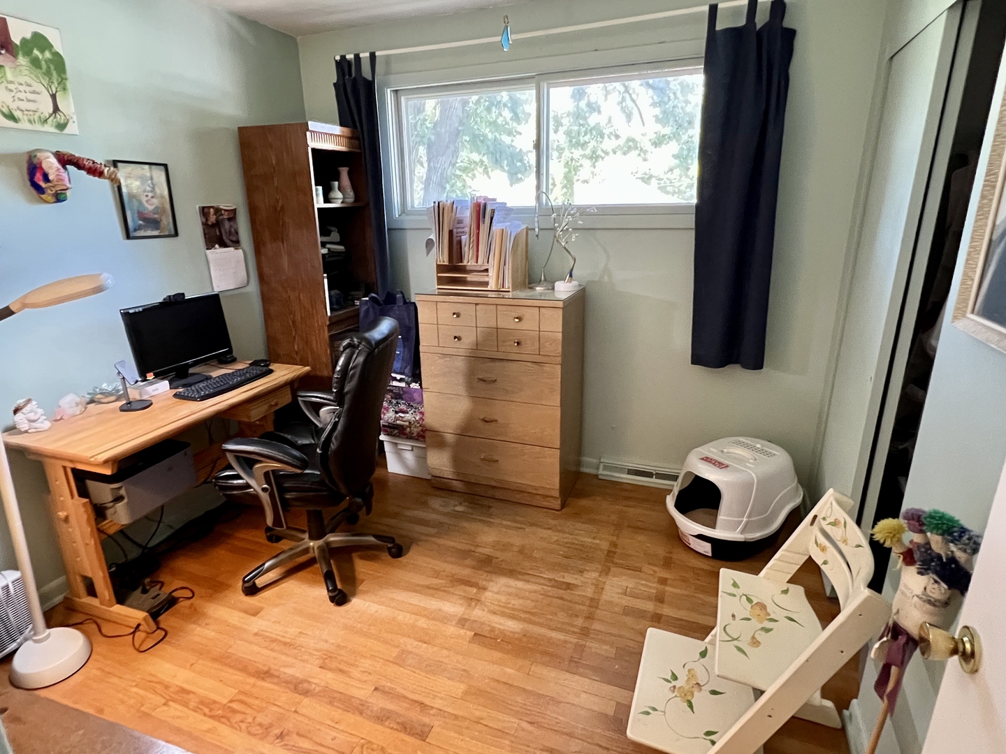 3819 Rugen Road Glenview, IL 60025 - Photo 13 of 24 a view of a workspace with furniture and a window