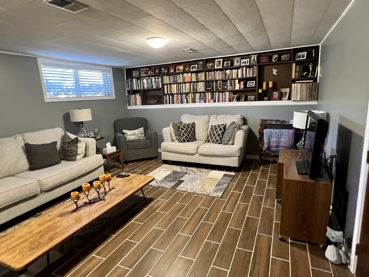 3819 Rugen Road Glenview, IL 60025 - Photo 15 of 24 a living room with furniture and wooden floor