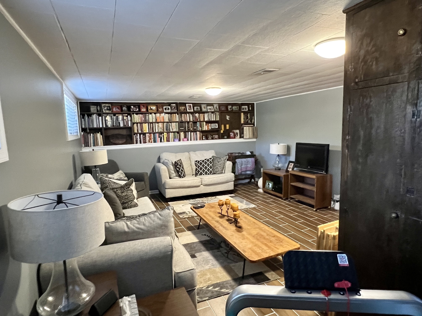 3819 Rugen Road Glenview, IL 60025 - Photo 17 of 24 a living room with furniture and a flat screen tv