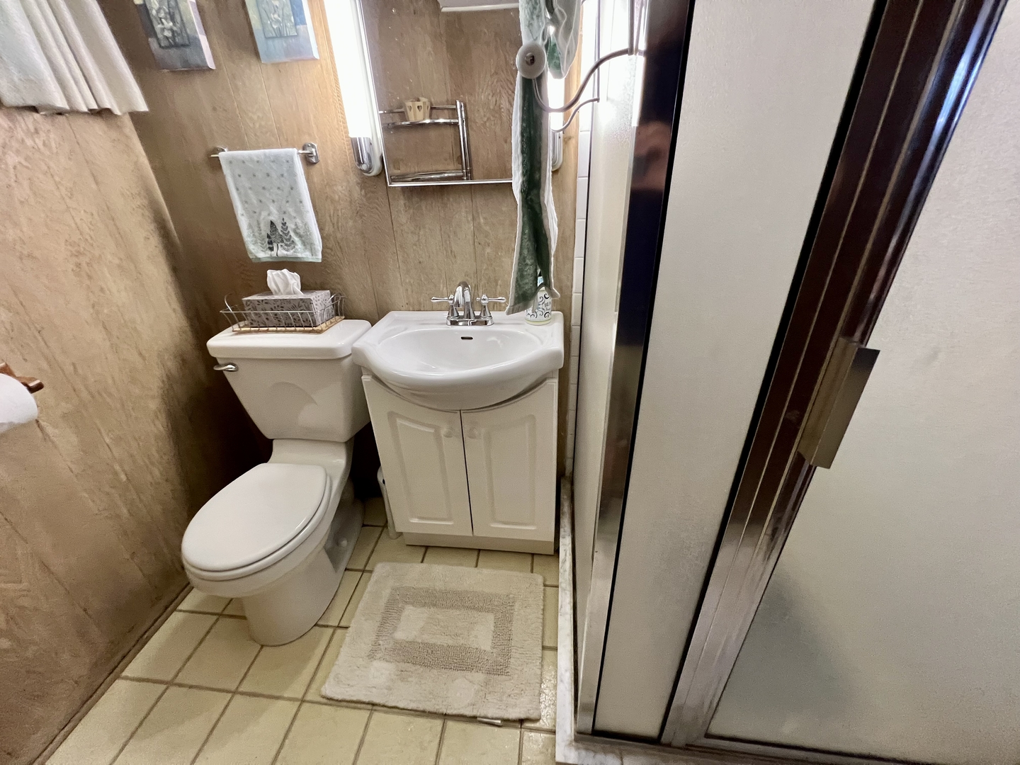 3819 Rugen Road Glenview, IL 60025 - Photo 19 of 24 a bathroom with a sink and toilet