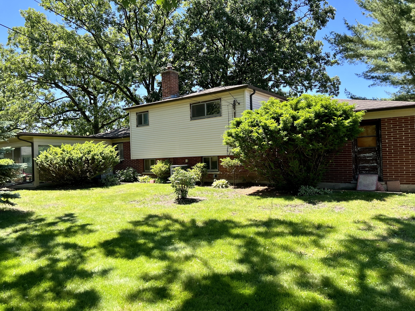3819 Rugen Road Glenview, IL 60025 - Photo 23 of 24 a view of backyard with a garden