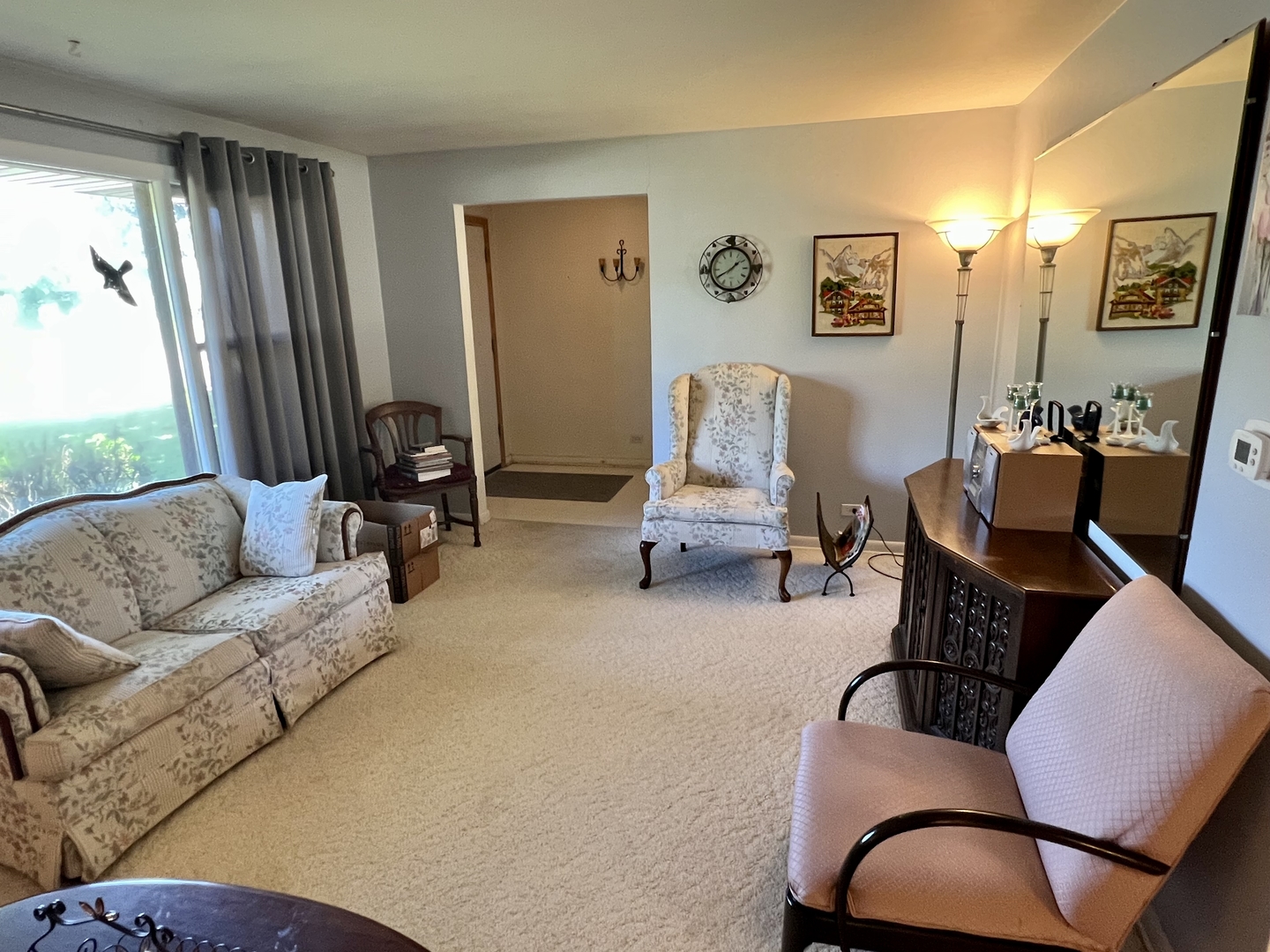 3819 Rugen Road Glenview, IL 60025 - Photo 4 of 24 a living room with furniture and a large window