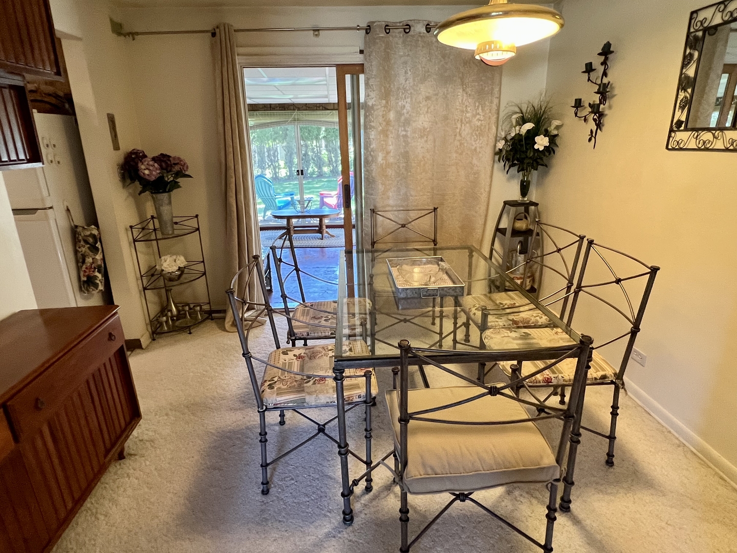 3819 Rugen Road Glenview, IL 60025 - Photo 6 of 24 a view of a dining room with furniture and a chandelier