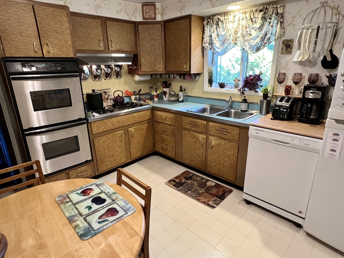 3819 Rugen Road Glenview, IL 60025 - Photo 8 of 24 a kitchen with sink cabinets and appliances
