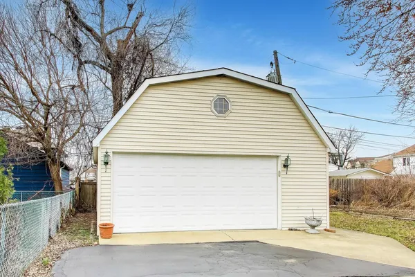 a view of a house with a garage