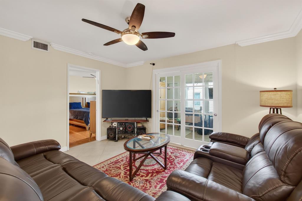 19000 Stewart Circle, Unit 4 Boca Raton, FL 33496 - Photo 19 of 63 a living room with furniture and a flat screen tv