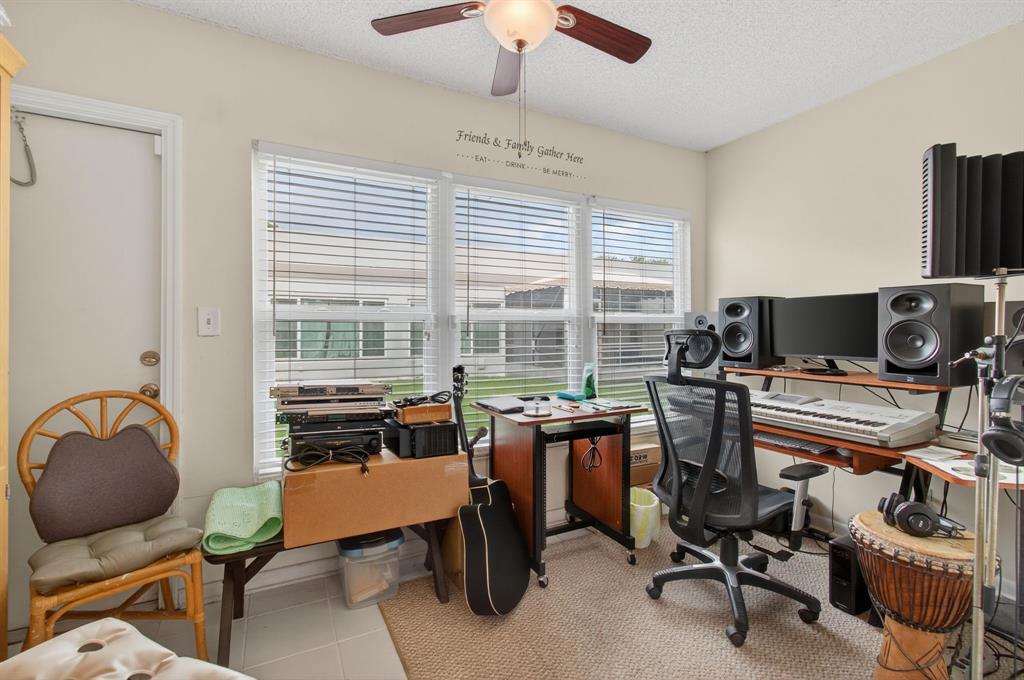 19000 Stewart Circle, Unit 4 Boca Raton, FL 33496 - Photo 25 of 63 a view of a workspace with furniture and a window